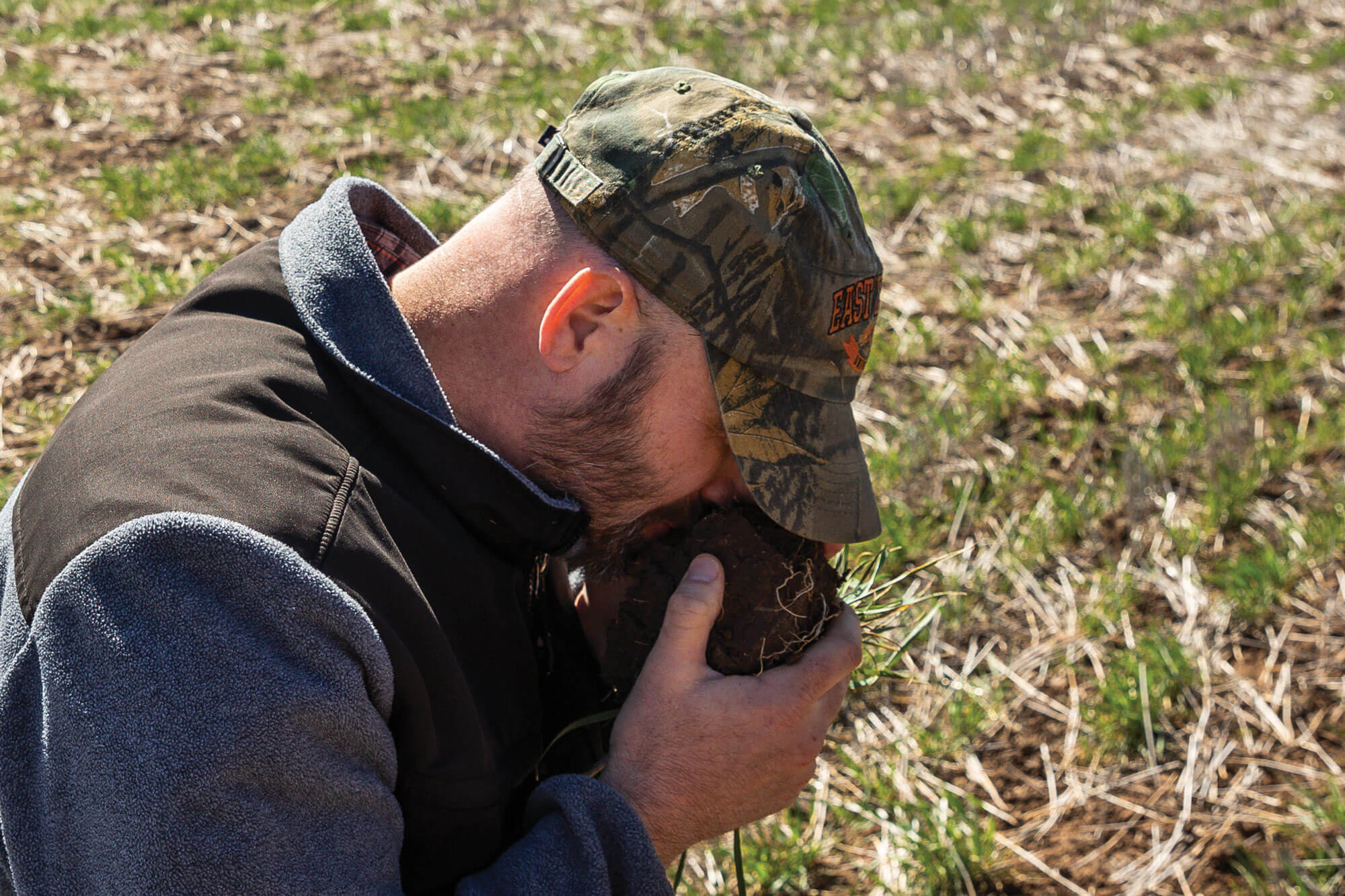 Noble consultant Jim Johnson smells the soil to see if it has the correct odor