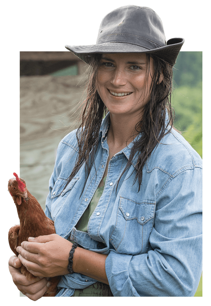 Andrea Todt holds a chicken